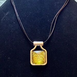 Vintage Like Faux Peridot in a Bezel Silver Tone Pendant on a Black Plastic Rope